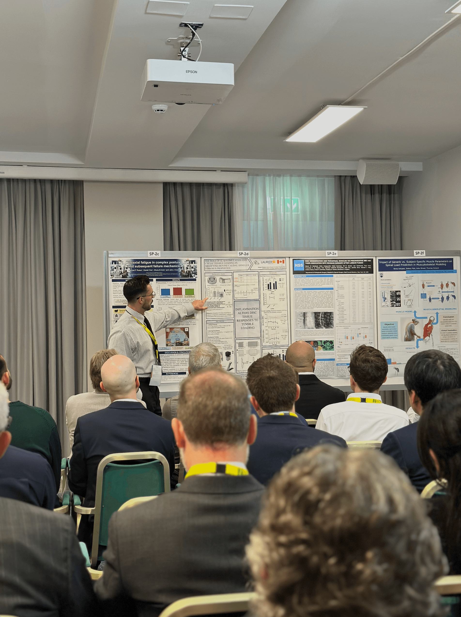 Mitch Whittal presenting award-winning spine biomechanics research at the ISSLS Conference in Milan